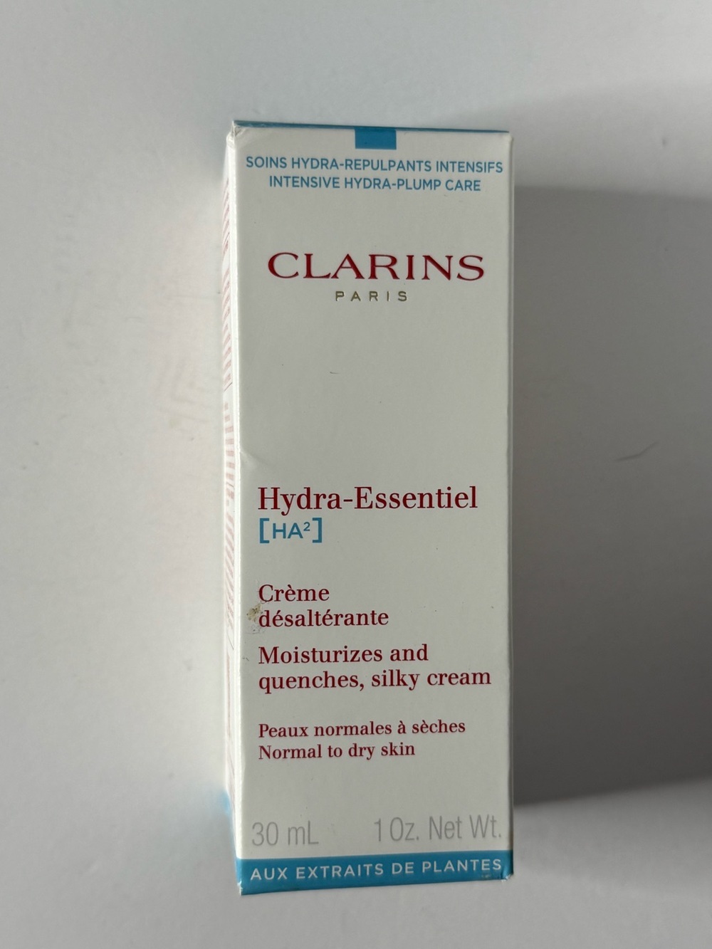 Clarins Hydra-Essentiel Moisturizer – White with Blue Accents